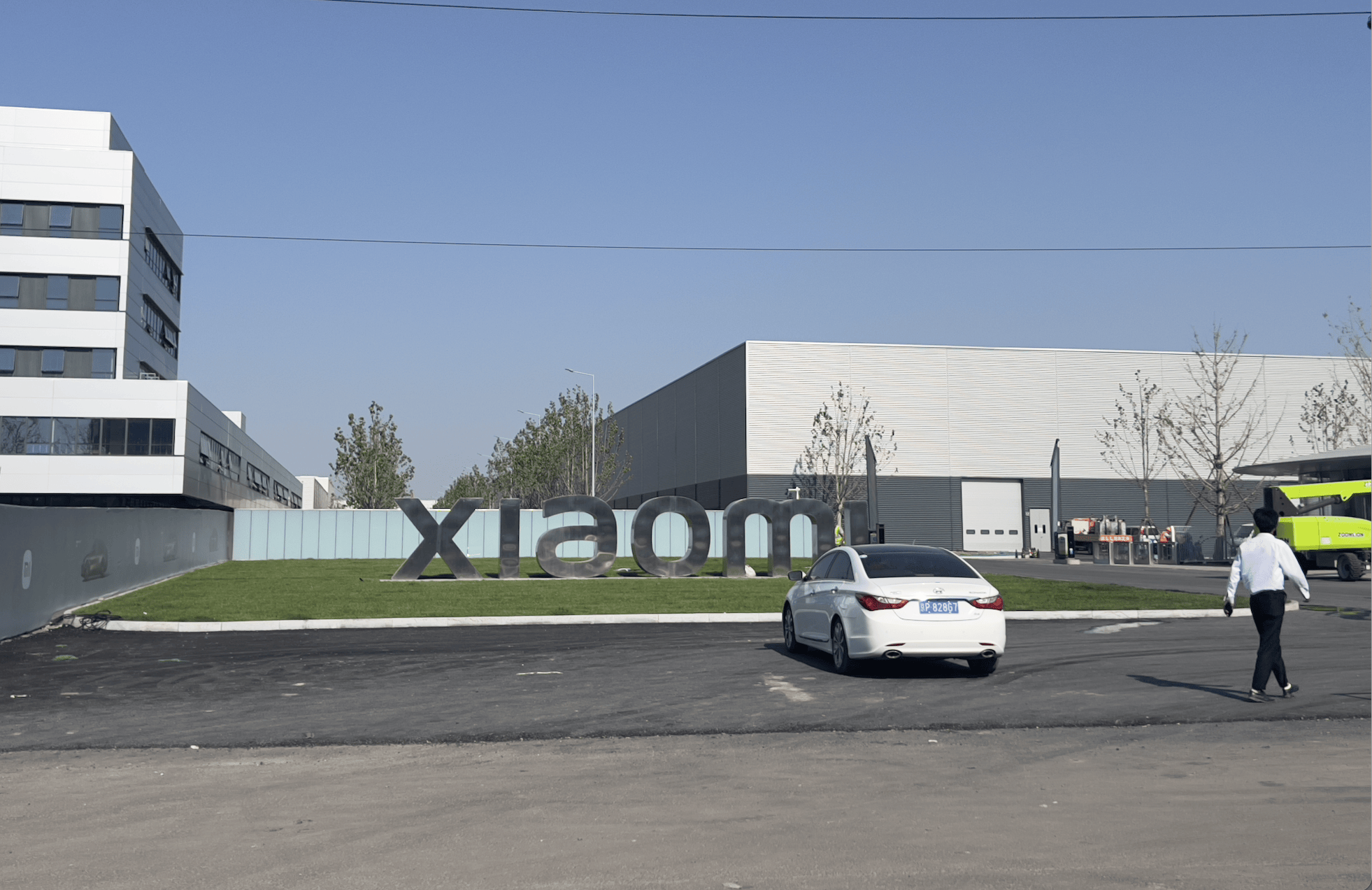 提YU7要等多久？实探小米汽车工厂：SU7大量装车<strong></p>
<p>币币网数字交易平台</strong>，二期工厂外立面已完工